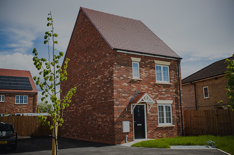 A newly completed red brick family home built by Access Building Solutions